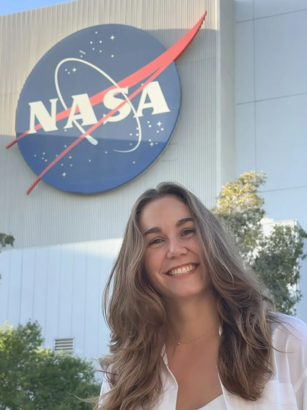 Emma Vellard smiling at NASA JPL